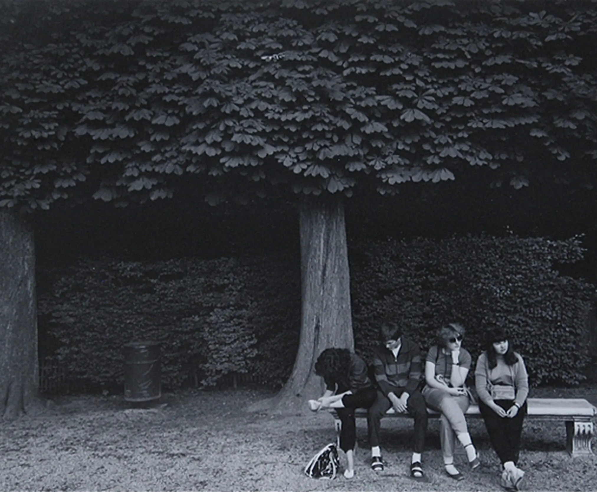 Black and white park scene with people